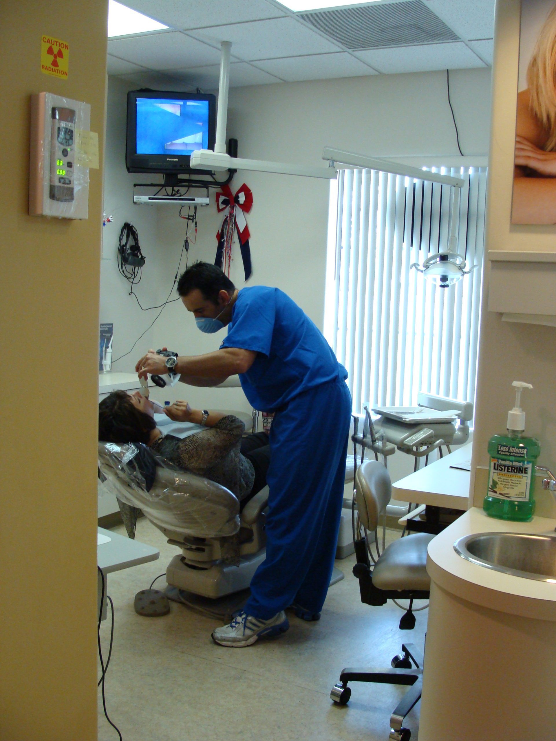Dr. Eslampour treating a dental patient